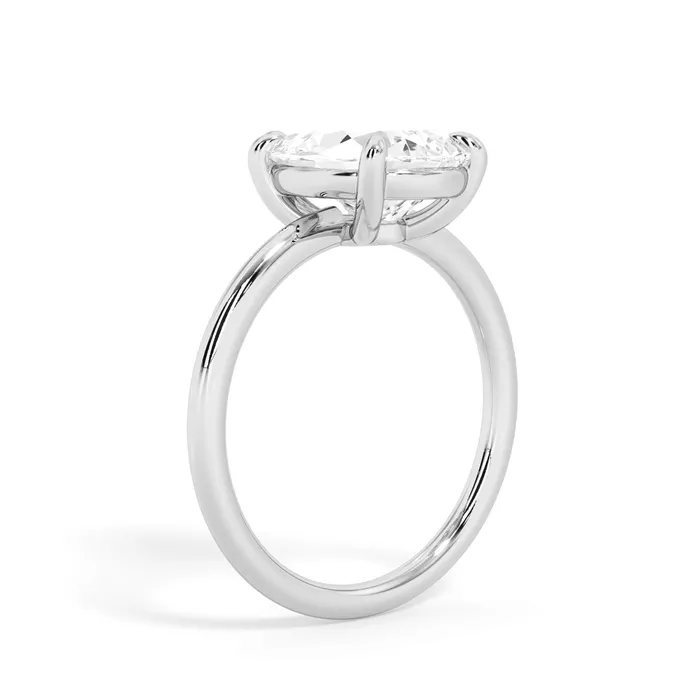 Basket Style Solitaire Engagement Ring deBebians Rings