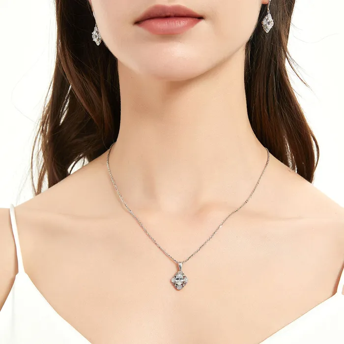 Halo Flower Oval CZ Set in Sterling Silver BERRICLE Earrings