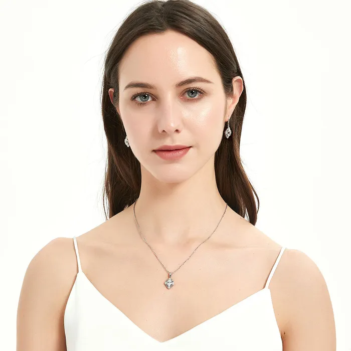 Halo Flower Oval CZ Set in Sterling Silver BERRICLE Earrings